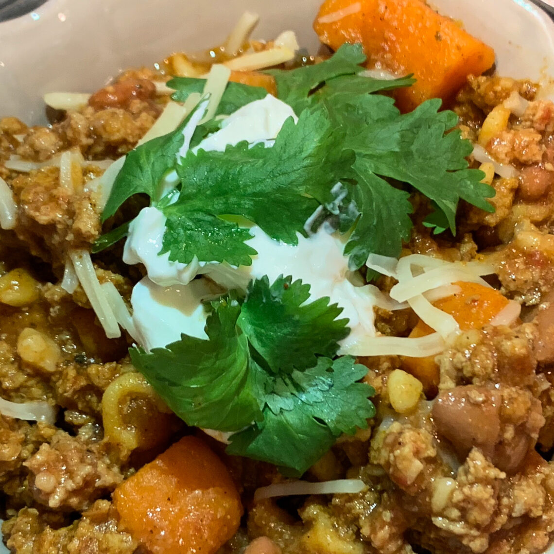 close up of chili made with homemade canned tomato juice