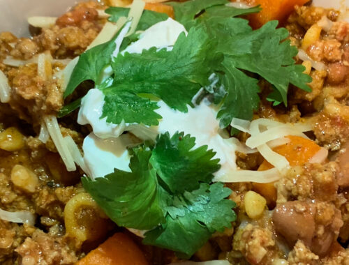 close up of chili made with homemade canned tomato juice