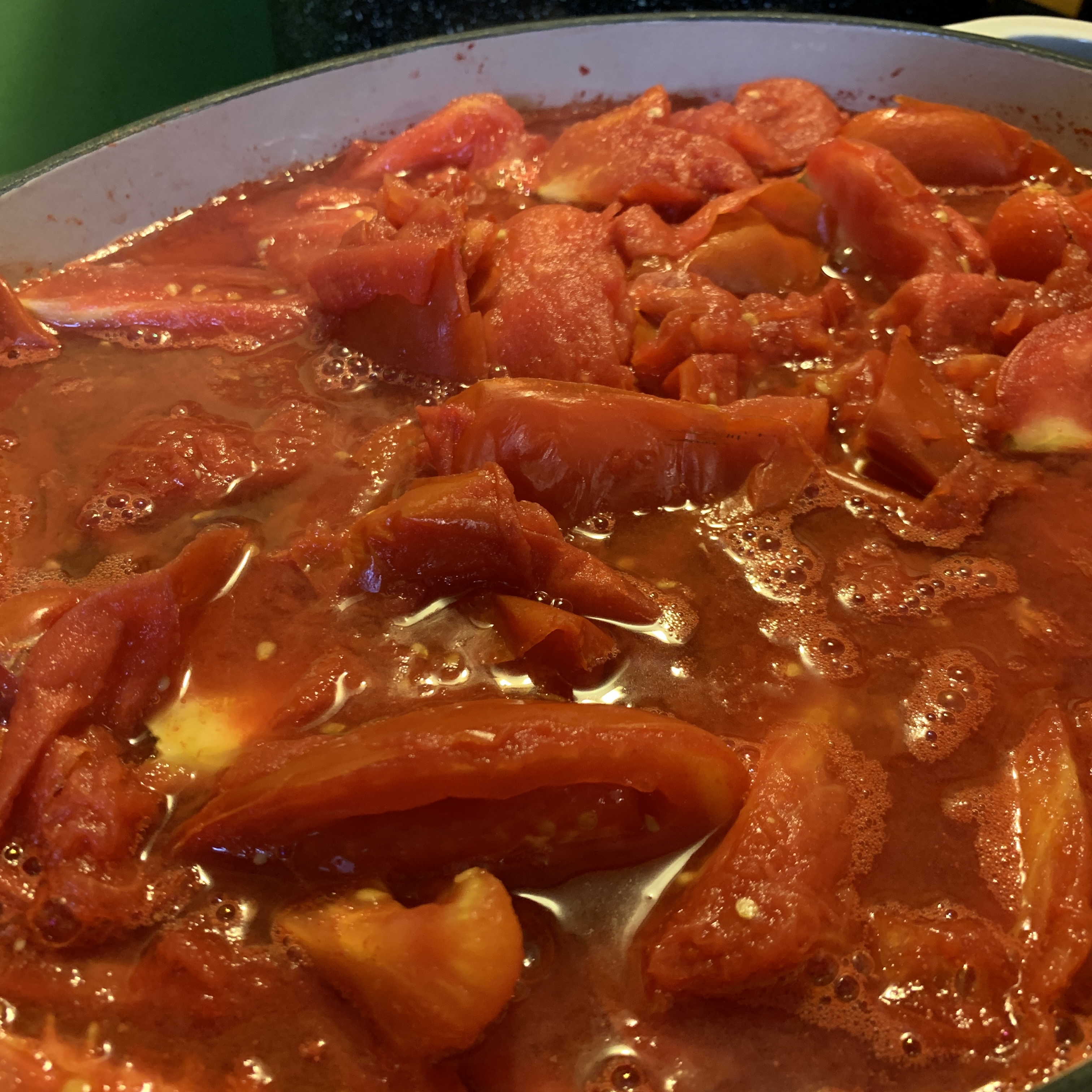cooking tomatoes in dutch oven for canning