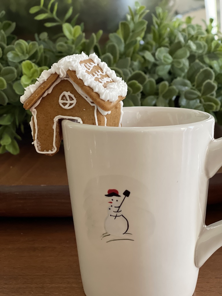 tiny gingerbread house on hot chocolate mug