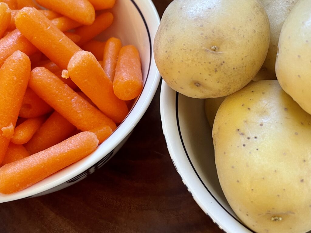 Baby carrots and potatoes ingredients for the Pot Roast Comfort Food recipe