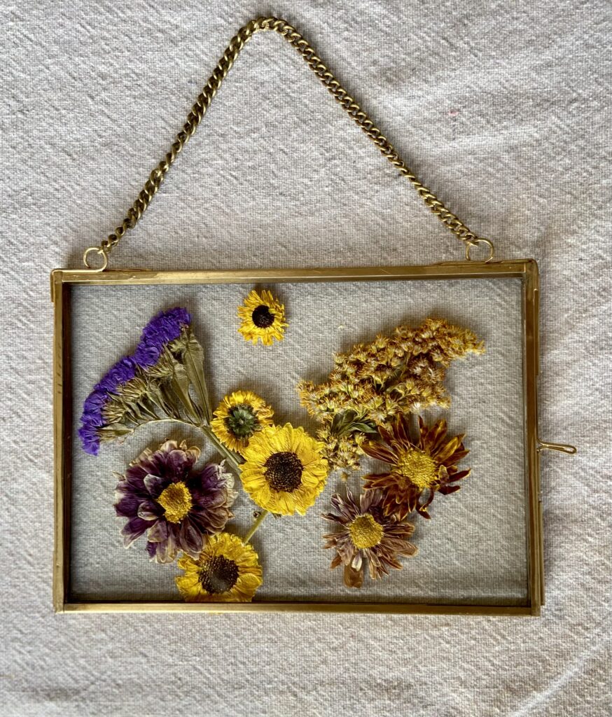 pressed flowers in gold hanging frame heart gift
