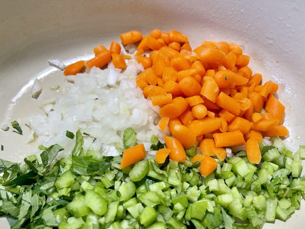 chopped carrots, onions, celery in olive oil in a dutch oven