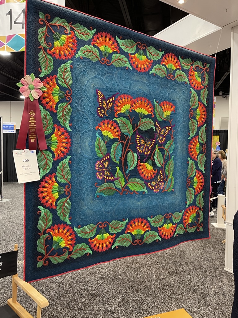 colorful free motion first place AQS quilt show 2022