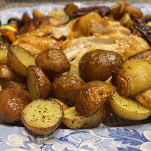 Blue toile platter with roasted veggies, potatoes and rotisserie chicken