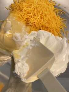 Soup, cheese, sour cream to add to hash brown potato casserole recipe