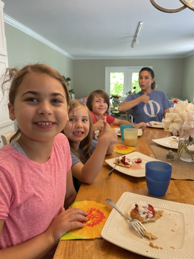Happy Group eating Dutch baby pancakes