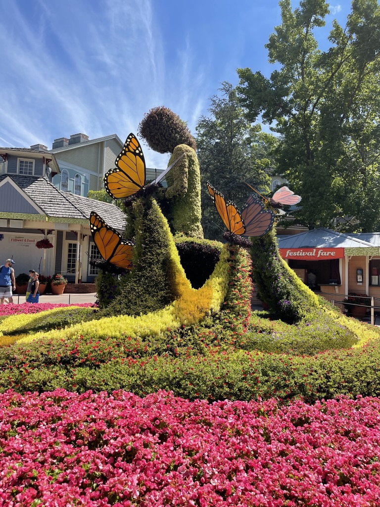 Large girl topiary with butterflies
