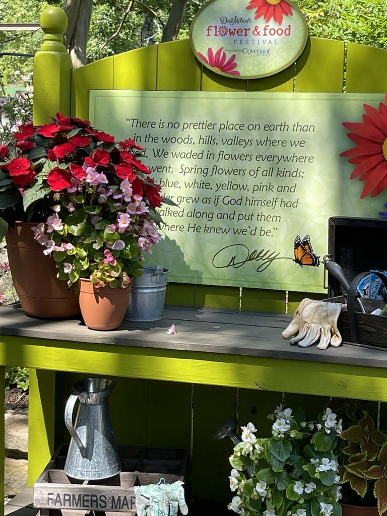 Dollywood Garden Bench with Dolly's words of wisdom sign
