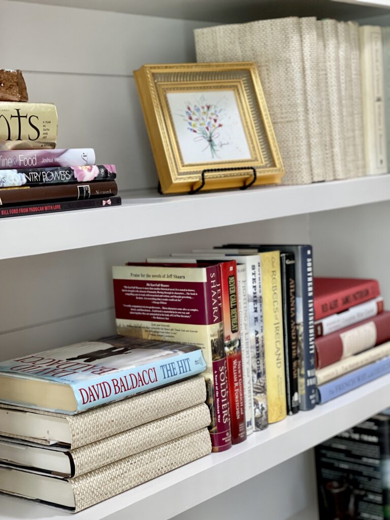 books on bookshelf at Designer Showcase House