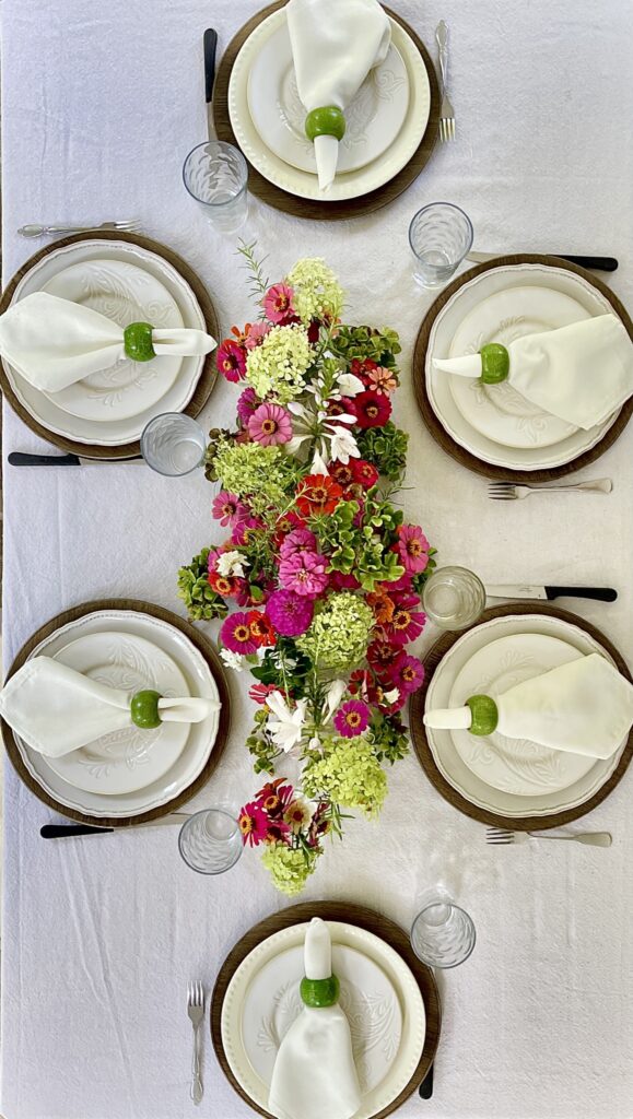 table settings with flower centerpiece