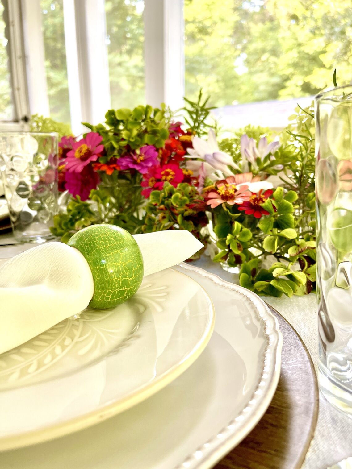 table setting with low flower arrangement