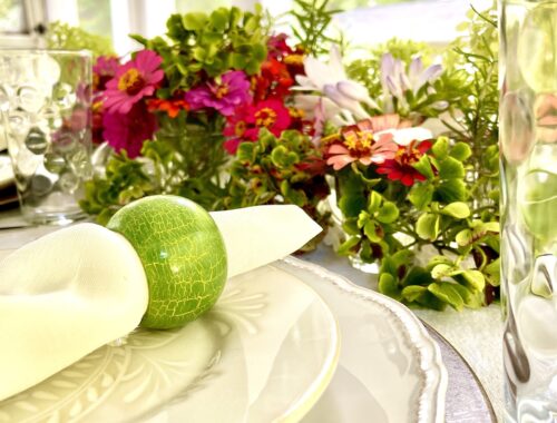 table setting with low flower arrangement