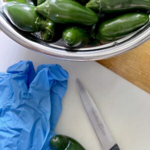 set up for cutting jalapenos with gloves