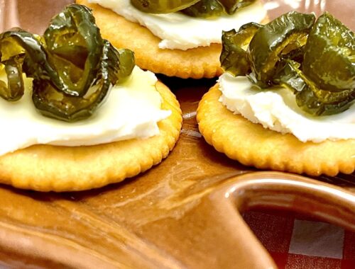 candied jalapenos on crackers with cream cheese