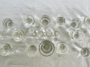 small clear vases with water