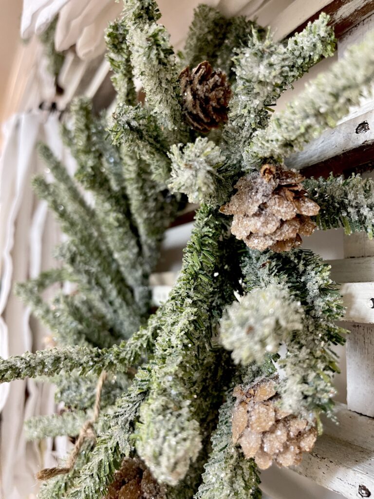 Frosted small wreath with pine cones