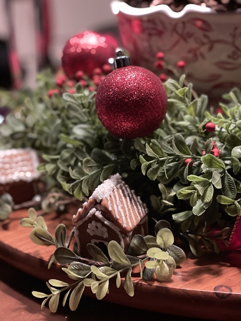 Christmas table centerpiece with gingerbread house