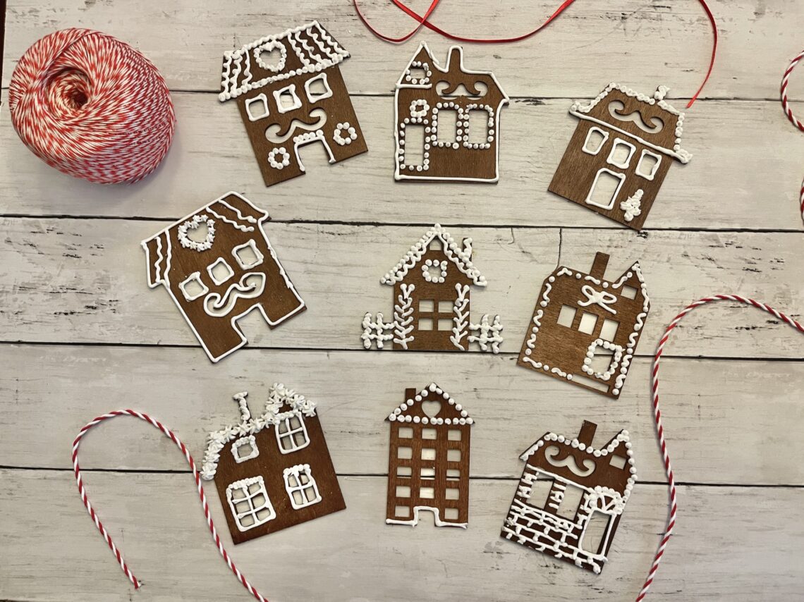 group of decorated gingerbread house ornaments