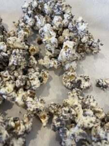 Oreo popcorn on parchment paper