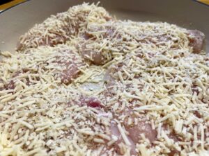 Pan of uncooked Chicken Parmesan