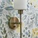 sconce hung on peel and stick wallpaper
