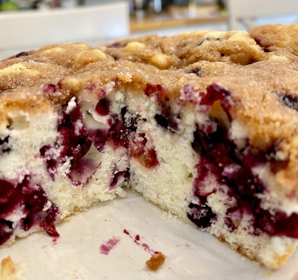 blueberry coffee cake with piece out