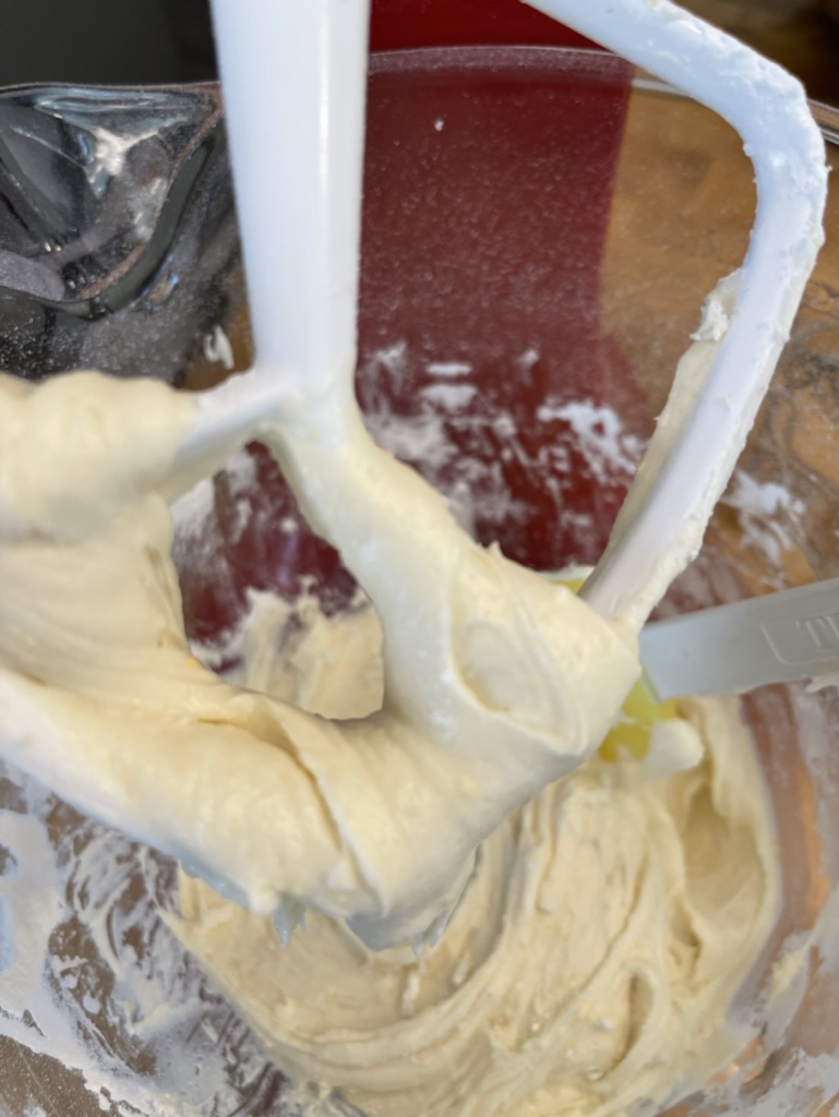 mixing batter for blueberry coffee cake