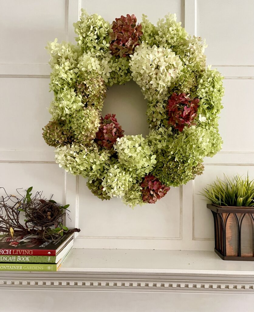 fall mantel with hydrangea wreath