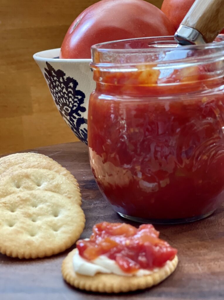 Tomato Jam jar with crackers and cheese