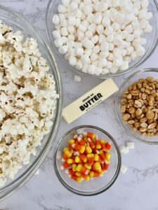 Ingredients for candy corn popcorn balls