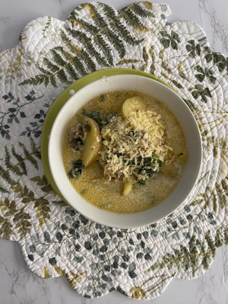 zuppa toscano soup in bowl on placemat