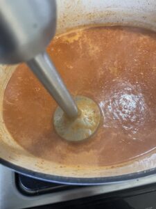 immersion blender in grilled cheese tomato soup