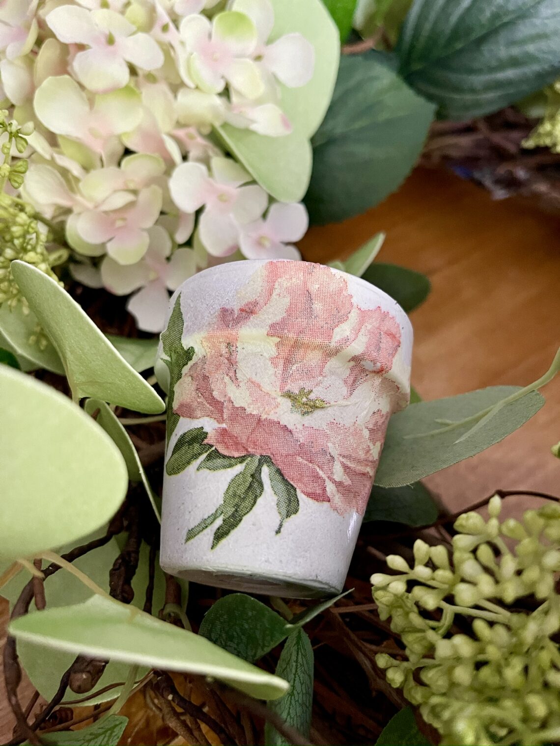 tiny decoupage herb garden pot added to hydrangea wreath