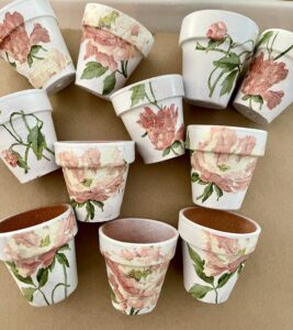 group of decoupage pots to fill with lemon balm