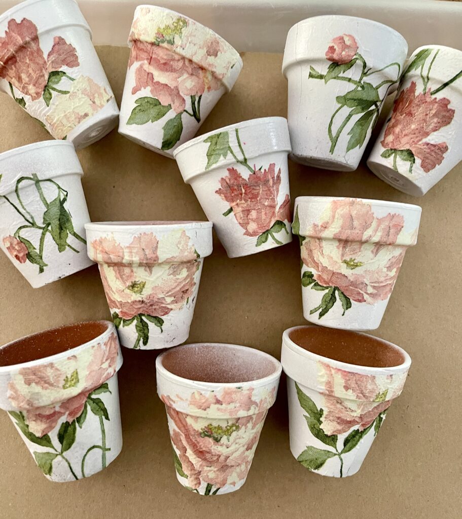 group of decoupage pots to fill with lemon balm