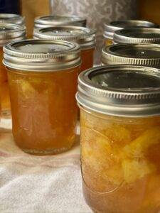 half pint jars of canned peach jam