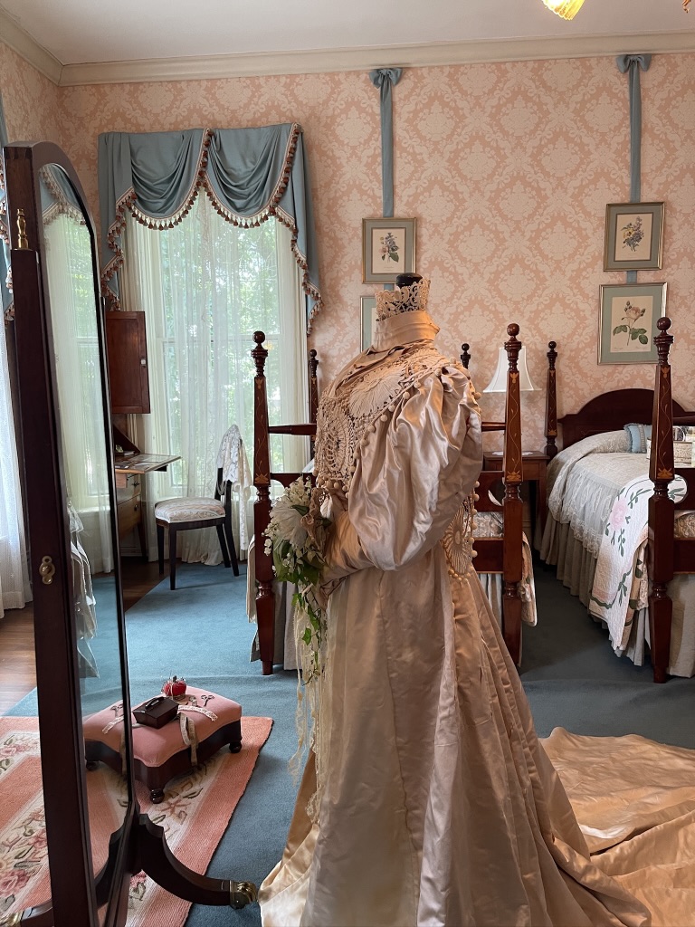 Side view of Selina's Victorian wedding gown at Adsmore