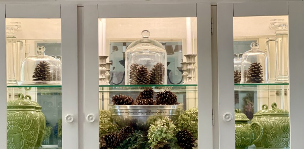 top view of hutch with pine cones and hydrangea