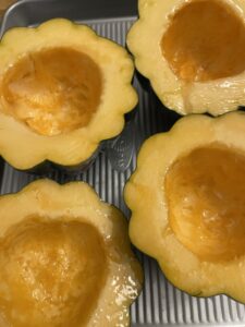 cut acorn squash with olive oil