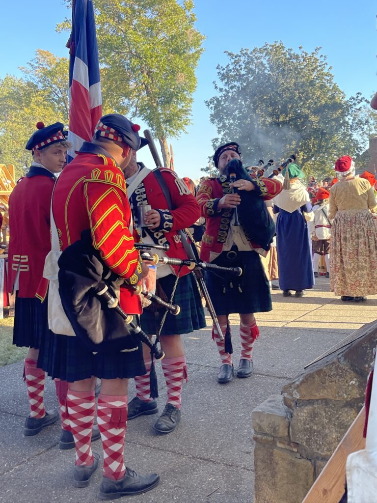 scottish band at encampment in metropolis 2024