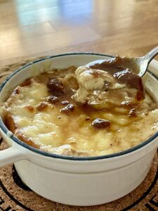 French Onion soup in cast iron serving tureen