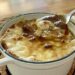 French Onion soup in cast iron serving tureen