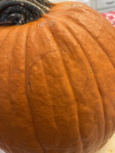 add design onto pumpkin before cutting