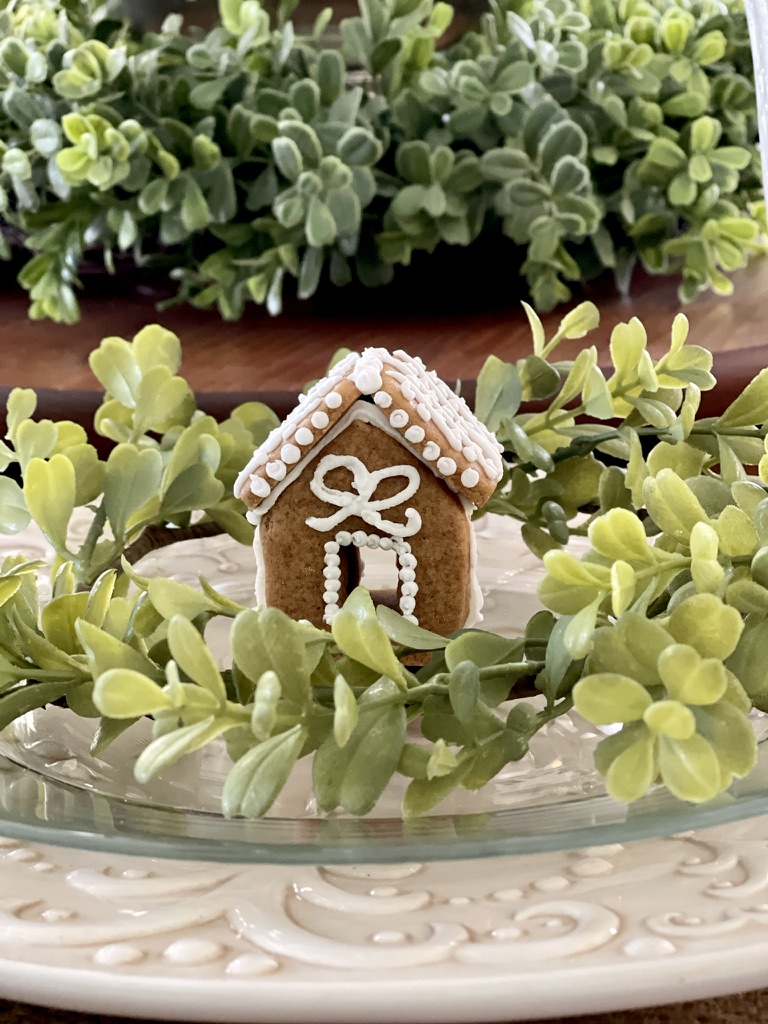 white charger, clear plate with gingerbread house