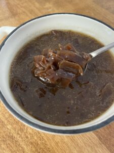 French onion soup added to broiling serving dish