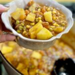 beef stew ladled into bowls