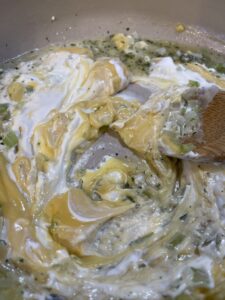 sour cream, cooking sherry, and pesto added to celery, onion and butter for chicken and rice casserole