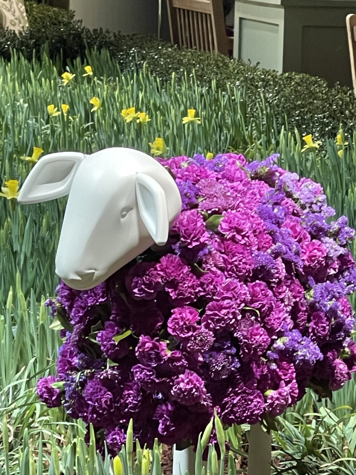 Purple floral sheep in the entrance garden at the 2025 Antiques and Garden Show of Nashville