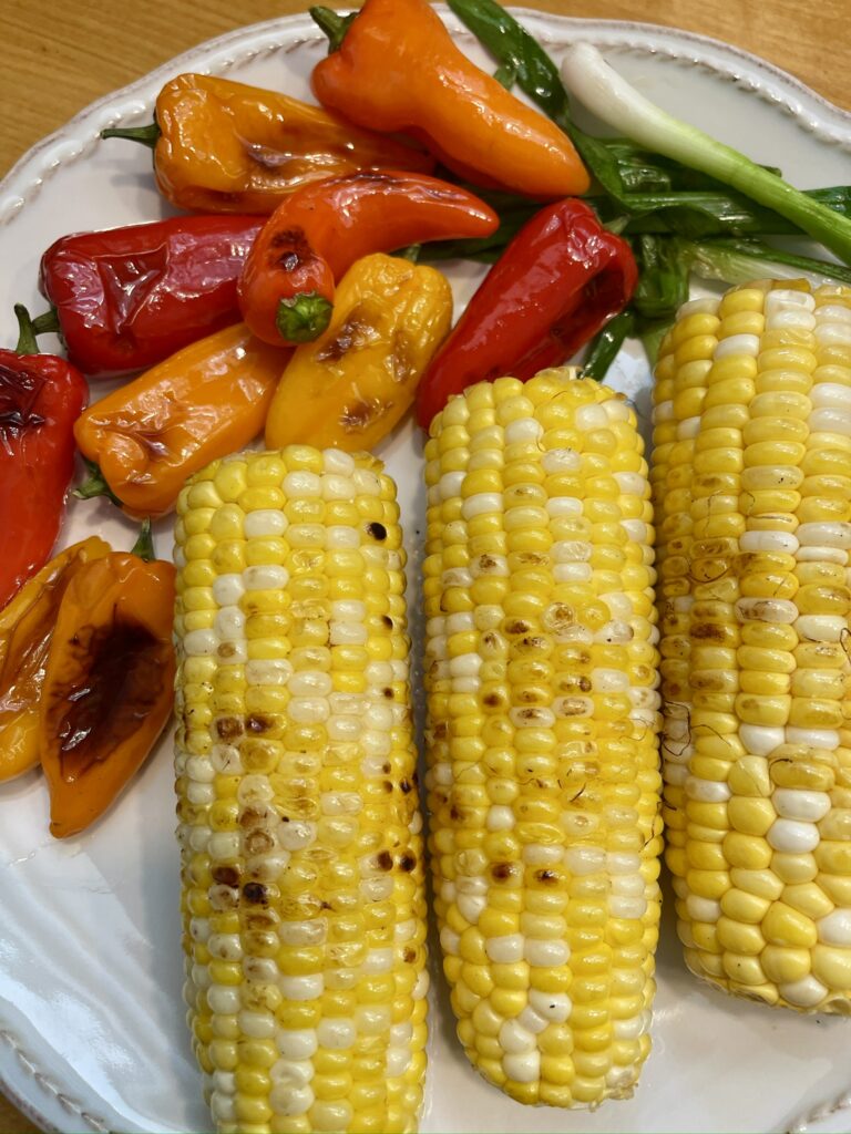 Let roasted corn, peppers and onions cool